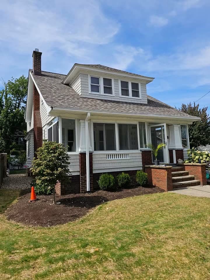 Bungalow-style home exterior with a screened front porch